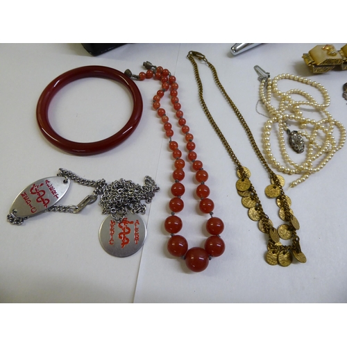 75 - Items and personal ornament and small collectables: to include cufflinks; and coloured bead necklace... 