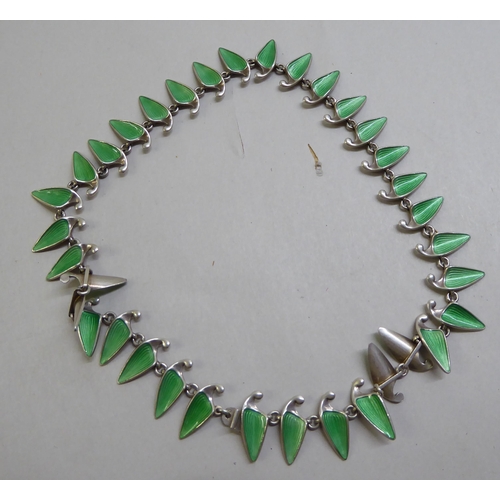 93 - A Norwegian Sterling silver and enamel set shark tooth design necklace 