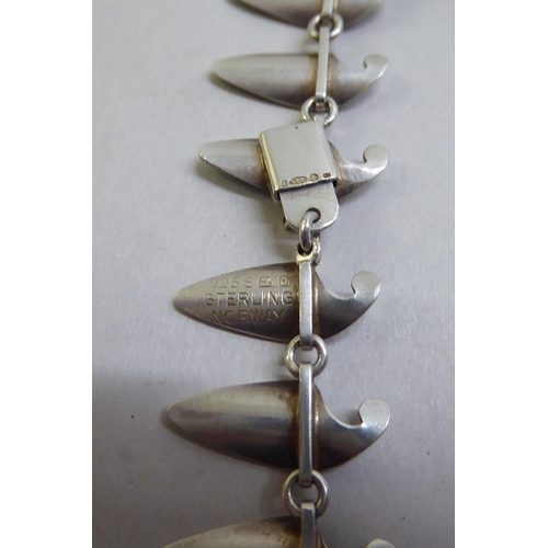 93 - A Norwegian Sterling silver and enamel set shark tooth design necklace 