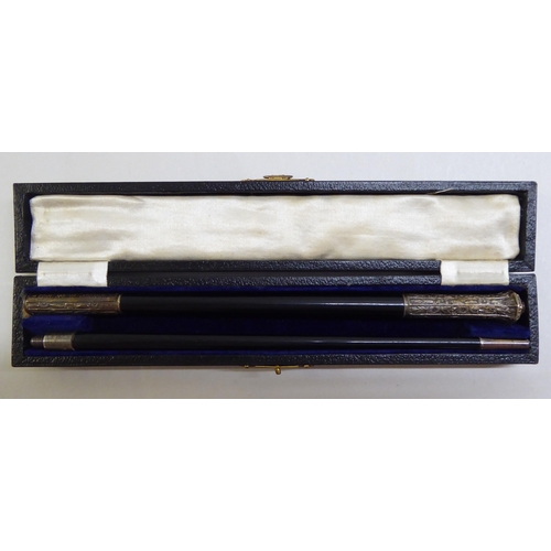 94 - A silver mounted ebonised two part choirmaster's conductor baton  London 1922  cased