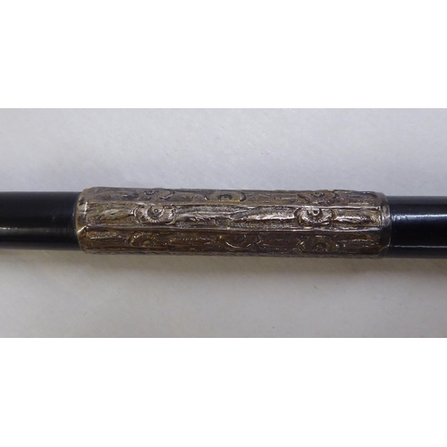 94 - A silver mounted ebonised two part choirmaster's conductor baton  London 1922  cased