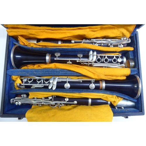 95 - A French steel and hardwood Clarinet  cased