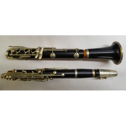 95 - A French steel and hardwood Clarinet  cased