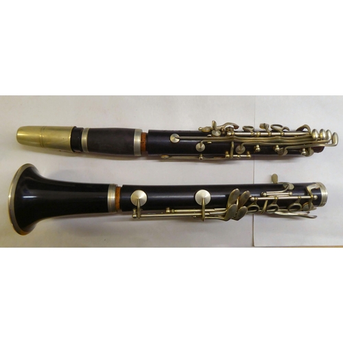 95 - A French steel and hardwood Clarinet  cased