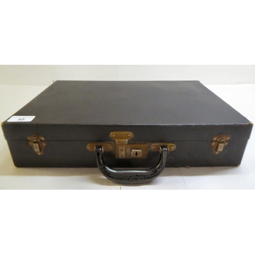 95 - A French steel and hardwood Clarinet  cased