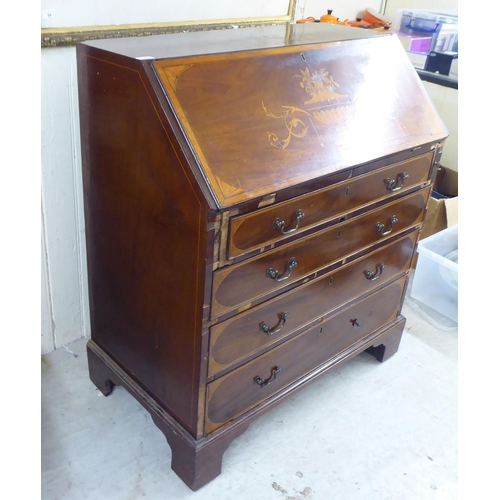 98 - An Edwardian string inlaid marquetry bureau, the fall flap over four graduated drawers, raised on br... 