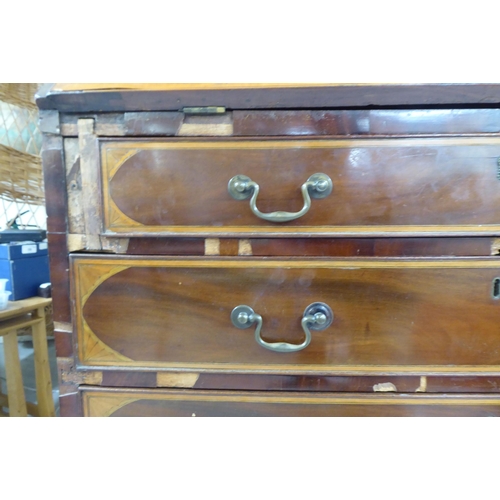 98 - An Edwardian string inlaid marquetry bureau, the fall flap over four graduated drawers, raised on br... 