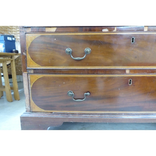 98 - An Edwardian string inlaid marquetry bureau, the fall flap over four graduated drawers, raised on br... 