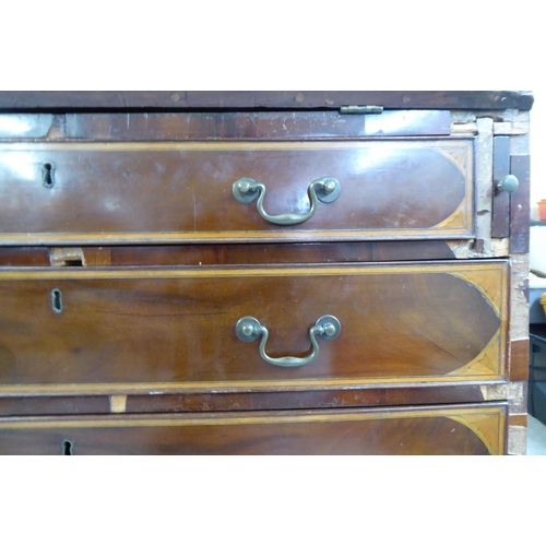 98 - An Edwardian string inlaid marquetry bureau, the fall flap over four graduated drawers, raised on br... 