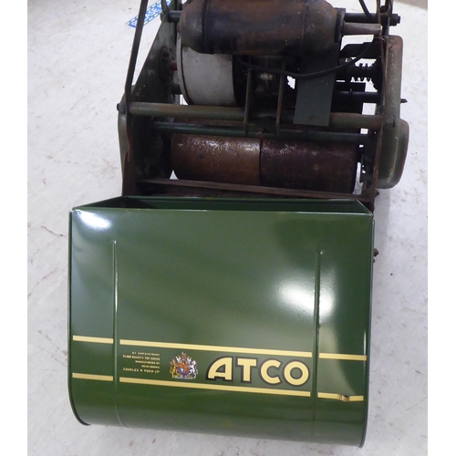 99 - A vintage ATCO petrol driven lawn mower with a 16