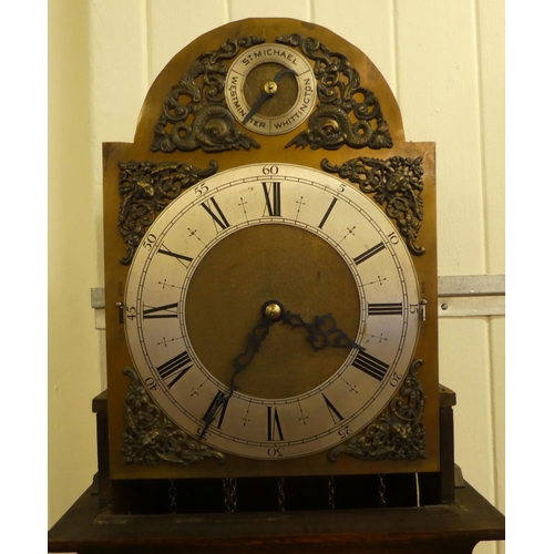 113 - A mid 20thC oak cased longcase clock; the three tone setting movement faced by a brushed steel and b... 