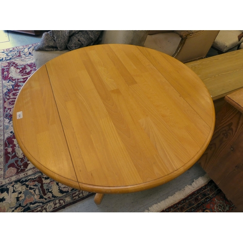 128 - A modern beech pedestal breakfast table  29