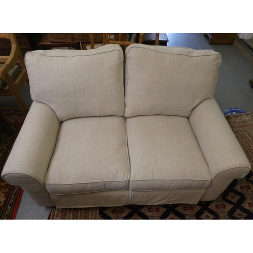 290 - A modern beige fabric upholstered two person bed settee