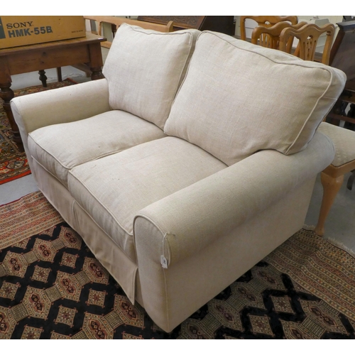 290 - A modern beige fabric upholstered two person bed settee