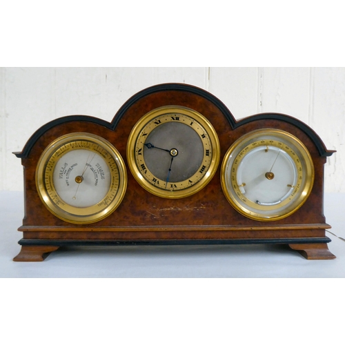 100 - A 20thC walnut cased desktop clock, incorporating a barometer, timepiece and thermometer  7.5