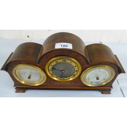 100 - A 20thC walnut cased desktop clock, incorporating a barometer, timepiece and thermometer  7.5