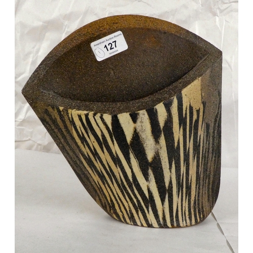 127 - A Paul Brown pottery, two-tone leaning pocket vase  bears a signature  10