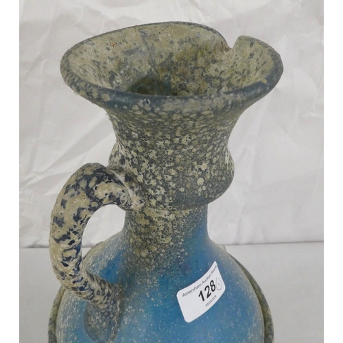 128 - An 'antique' finished, blue glass ewer  13.5