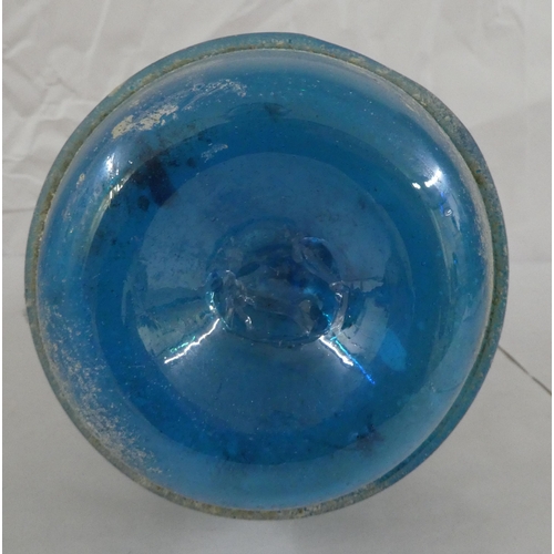 128 - An 'antique' finished, blue glass ewer  13.5