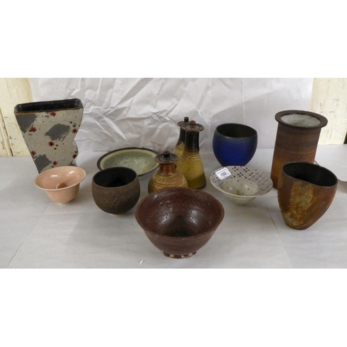 132 - Twelve items of named and other studio pottery: to include vases and bowls