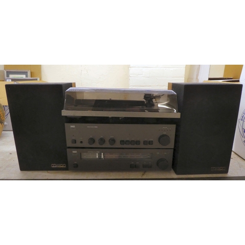 136 - A Revolver record deck; a NAD stereo amplifier 3020A; a stereo tuner 4020A; and a pair of Mission El... 