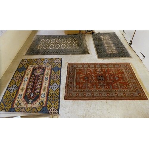 137 - Four dissimilar small rugs: to include a Turkoman  49