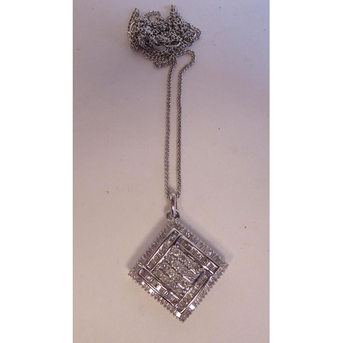 151 - An 18ct white gold and diamond set, square pendant, on a fine neckchain and ring bolt clasp