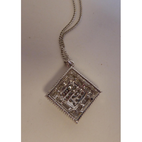 151 - An 18ct white gold and diamond set, square pendant, on a fine neckchain and ring bolt clasp