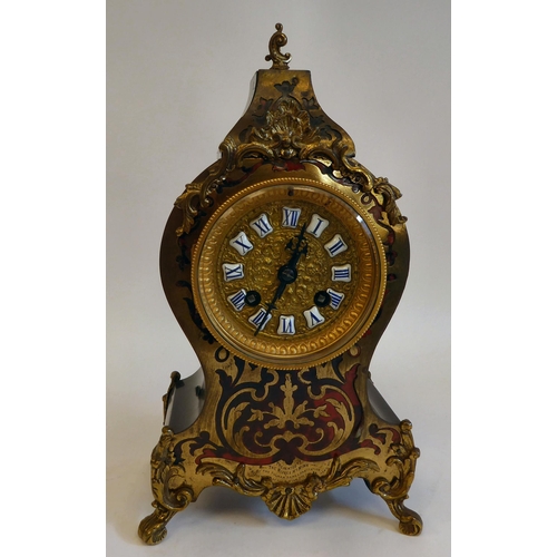 153 - A late 19thC French black lacquered and boulleworked cased mantel clock of waisted, balloon form; th... 