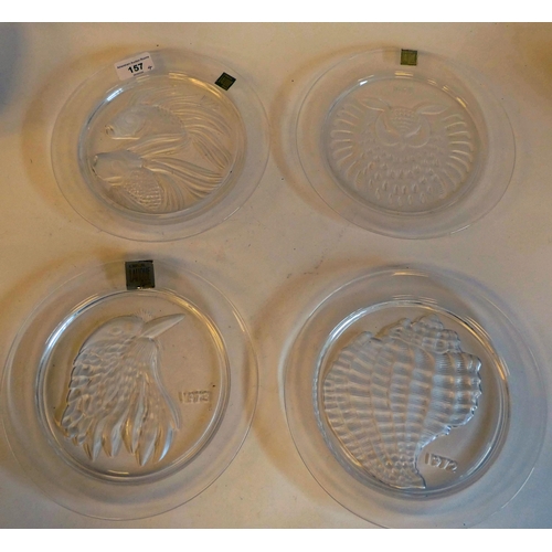 157 - A series of four Lalique Crystal Year plates, viz. '1971 Owl Hibou; '1972 Conch Shell'; '1973 The Ja... 