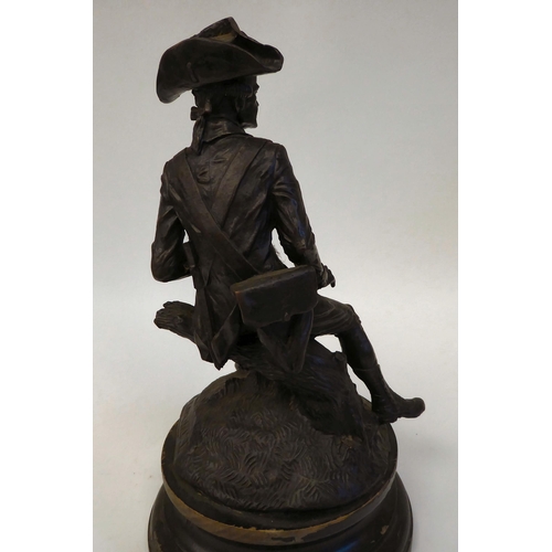 158 - After Rancoulet - a cast and patinated bronze figure, an 18thC soldier wearing a tricorn hat, seated... 