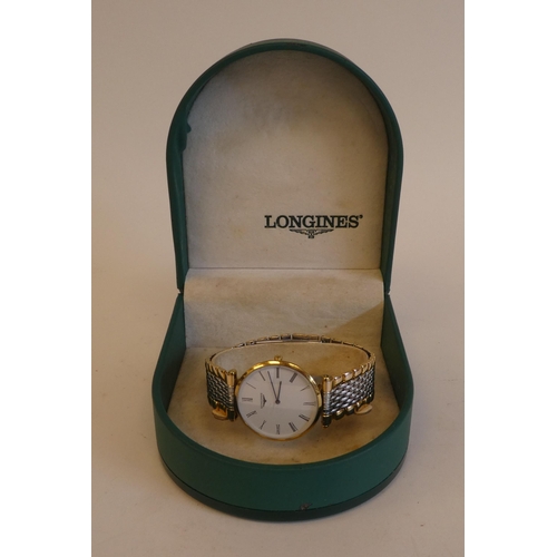 164 - A Longines La Grande Classique bi-coloured, stainless steel cased bracelet wristwatch, faced by a Ro... 