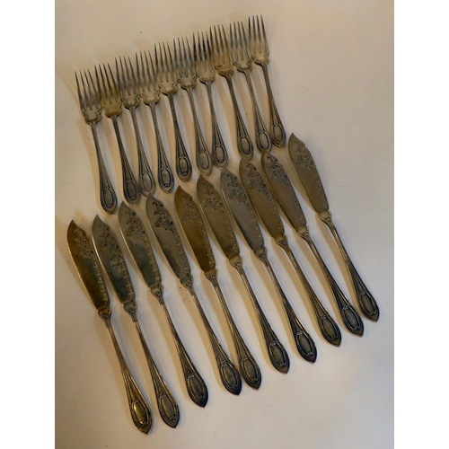 166 - A set of ten silver fish knives and forks with engraved blades and C-scrolled handles  Walker &... 