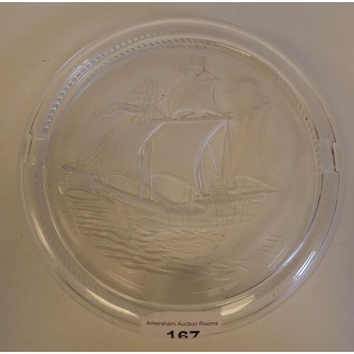 167 - A Lalique crystal ashtray, featuring a longboat under sail  bears an etched Lalique, France sig... 