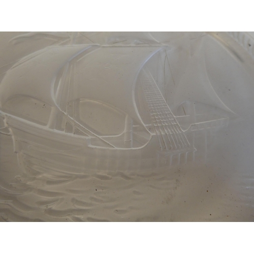 167 - A Lalique crystal ashtray, featuring a longboat under sail  bears an etched Lalique, France sig... 