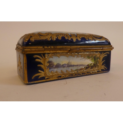 169 - A 19thC enamelled, painted and gilded, oblong patch box, the hinged lid depicting a huntsman and hou... 