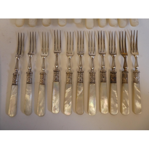 171 - A set of ten silver plated fruit knives and forks with mother-of-pearl handles