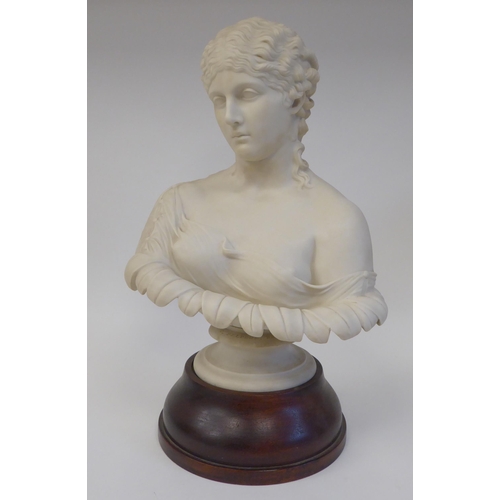 174 - A late 19thC Parianware bust, a young woman wearing a classical costume, her hair in ringlets  ... 