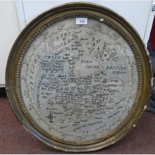 179 - An early 18thC oval embroidered county map of England and Wales with borders of Ireland and Scotland... 