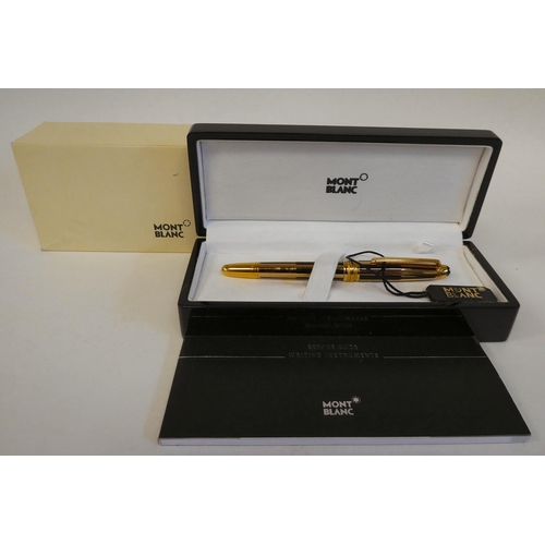 182 - A Mont Blanc bi-coloured and black cased ballpoint pen  stamped X.Y 2006108  boxed with certificate ... 