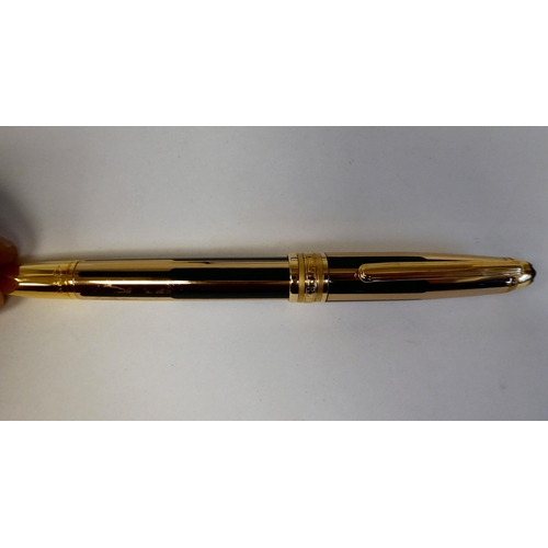 182 - A Mont Blanc bi-coloured and black cased ballpoint pen  stamped X.Y 2006108  boxed with certificate ... 