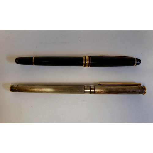 187 - A Mont Blanc bi-coloured stainless steel cased fountain pen, the nib stamped 750/18K; and a Mont Bla... 