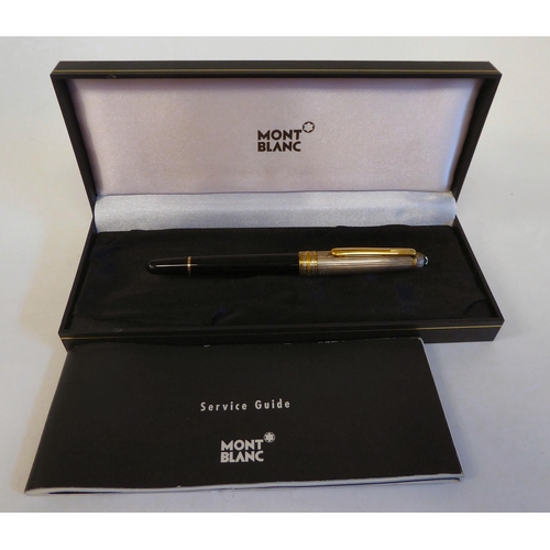 189 - A Mont Blanc bi-coloured and black cased fountain pen  stamped ng 925  boxed with certific... 