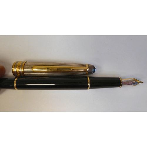 189 - A Mont Blanc bi-coloured and black cased fountain pen  stamped ng 925  boxed with certific... 