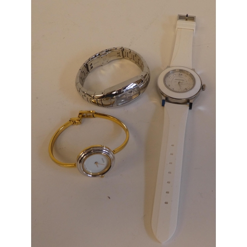 191 - Three modern ladies wristwatches, viz. Maurica Lacroix, Swarovski and Gucci  variously strapped