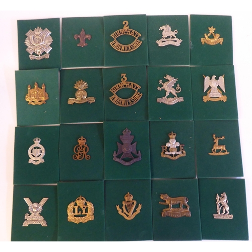 201 - A miscellaneous collection of Regimental cap badges and insignia, each mounted on card and identifie... 