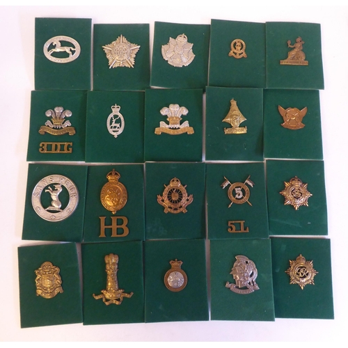 201 - A miscellaneous collection of Regimental cap badges and insignia, each mounted on card and identifie... 