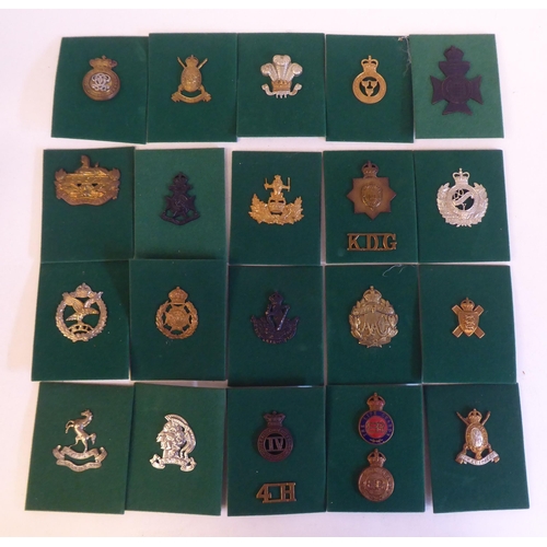 201 - A miscellaneous collection of Regimental cap badges and insignia, each mounted on card and identifie... 