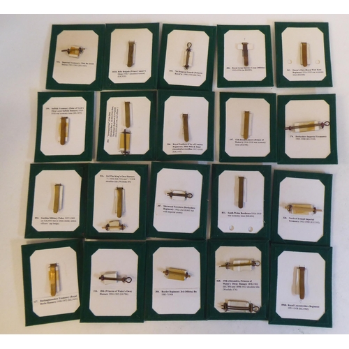 201 - A miscellaneous collection of Regimental cap badges and insignia, each mounted on card and identifie... 