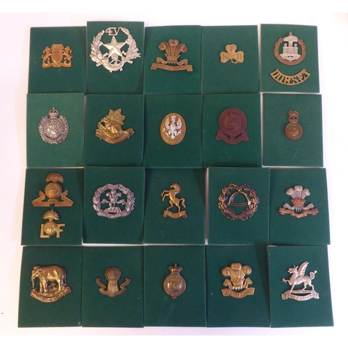 201 - A miscellaneous collection of Regimental cap badges and insignia, each mounted on card and identifie... 